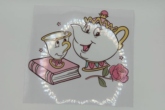Cartoon teapot and cup with a rose on a white background